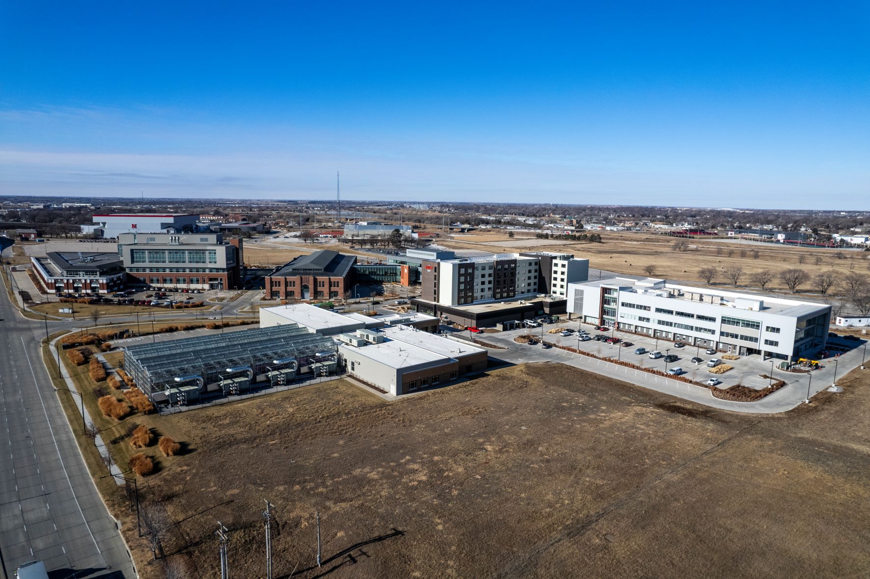 The Rise Building (right), is home to the Combine Incubator at Nebraska Innovation Campus. Two Combine-based companies have received federal small-business grants. | CRAIG CHANDLER, UNIVERSITY COMMUNICATIONS