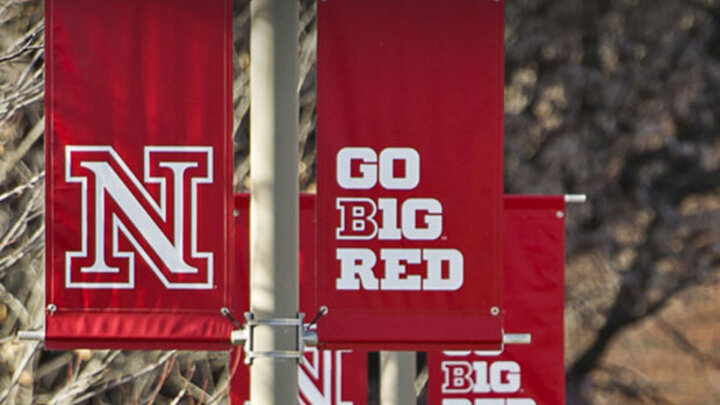 UNL Go B1G Red flags line downtown streets