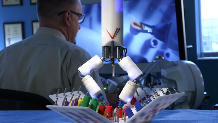 UNL professor Shane Farritor operates a Virtual Incision surgical robot in the groupâs Nebraska Innovation Center office and lab.