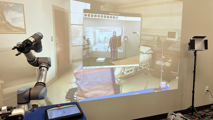 The Speculative Robotics Lab at Nebraska Innovation Campus includes a screen to help participants visualize the settings of care.