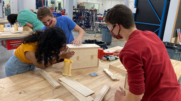 Students assemble toolboxes in Nebraska Innovation Studio on Oct. 17. The boxes will be given to the Whiteclay Makerspace. 